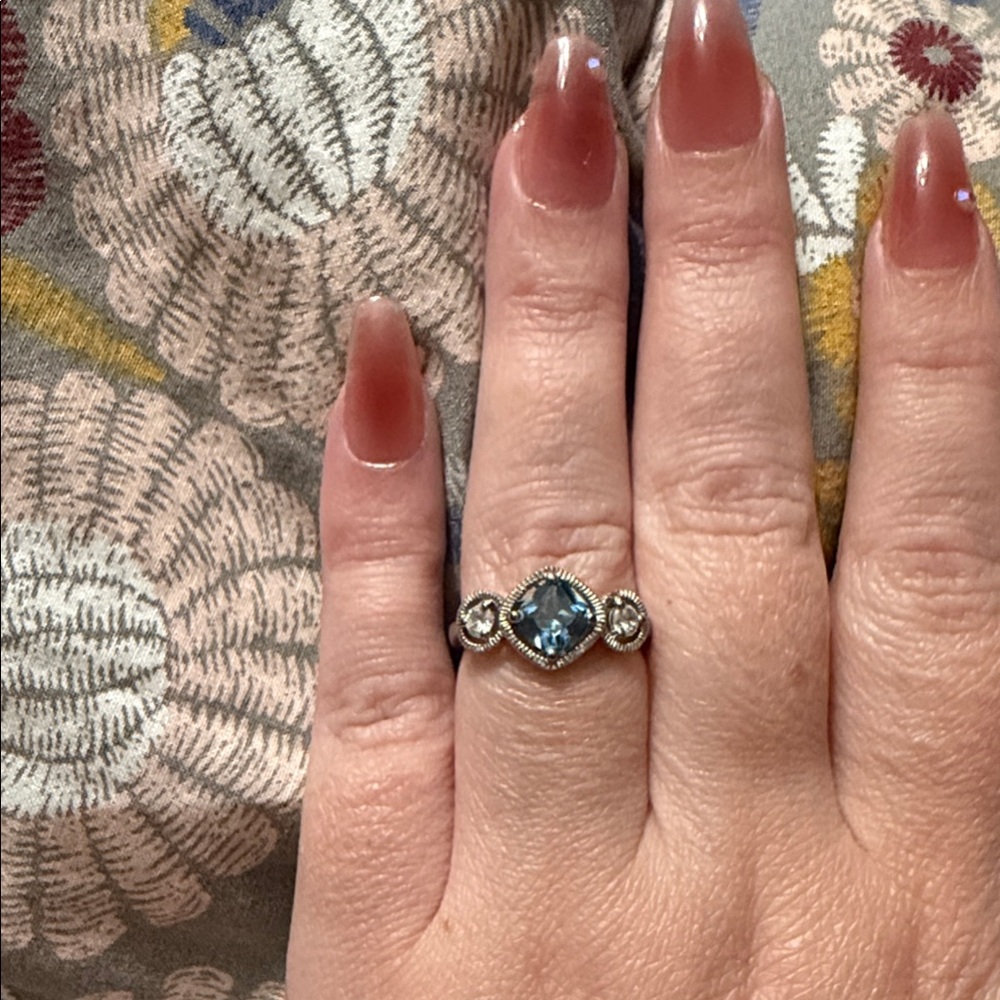 Elegant Blue and white topaz ring in sterling silver band